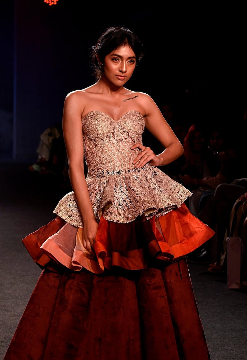 A model presents a creation by designer Ambika Lal during the Lakmé Fashion Week (LFW) Winter/Festive 2019 in Mumbai on August 24, 2019.  - XGTY / RESTRICTED TO EDITORIAL USE
 / AFP / Sujit Jaiswal / XGTY / RESTRICTED TO EDITORIAL USE
