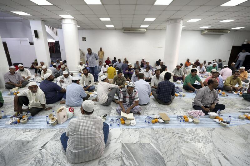 Dubai, United Arab Emirates - May 16, 2019: People prepare for Iftar. Mosque series for Ramdan. Lootah Masjid Mosque is an old mosque in Deira. Thursday the 16th of May 2019. Deira, Dubai. Chris Whiteoak / The National
