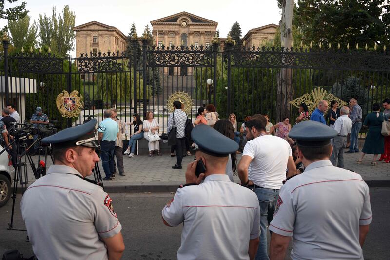 Armenian opposition supporters and relatives of servicemen wounded in the clashes with Azerbaijan's troops gather in front of Parliament in Yerevan to call for the resignation of Prime Minister Nikol Pashinyan. AFP