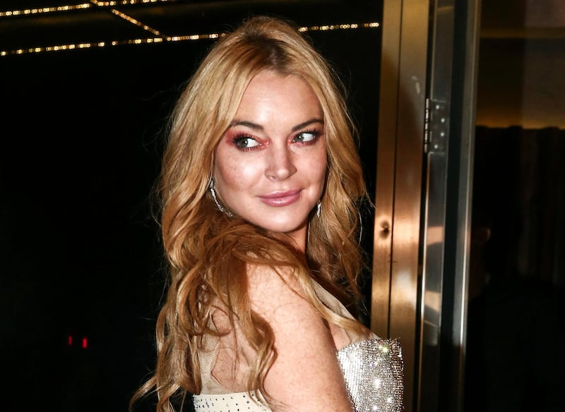 FILE - In this Oct. 16, 2016, file photo, actress Lindsay Lohan appears at the opening night of the Lohan Nightclub in Athens, Greece. Lohan sued a software company for using what she claims is a likeness of her in a video game. The New York Court of Appeals ruled Thursday, March 29, 2018, that the satirical representations of "a modern, beach-going" young woman are not identifiable as Lohan. The court affirmed a ruling from a lower state appeals court dismissing her lawsuit. (AP Photo/Yorgos Karahalis, File)