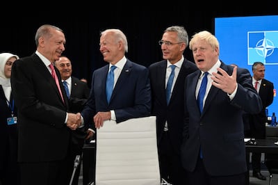 Left to right: Turkey's President Recep Tayyip Erdogan, US President Joe Biden, Jens Stoltenberg, and Britain's Prime Minister Boris Johnson at the start of the first plenary session of the Nato summit. AFP