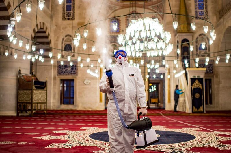 A member of the Istanbul's Municipality disinfects the Kilic Ali Pasa Mosque to prevent the spread of the COVID-19, the novel coronavirus, in Istanbul. Turkey announced on March 11, 2020 its first coronavirus case, a man who had recently travelled to Europe and is in good health. Turkey has announced several measures in recent weeks to try and stop the virus reaching the country, including thermal cameras at airports, cancelling flights to affected countries and closing its border with Iran. AFP