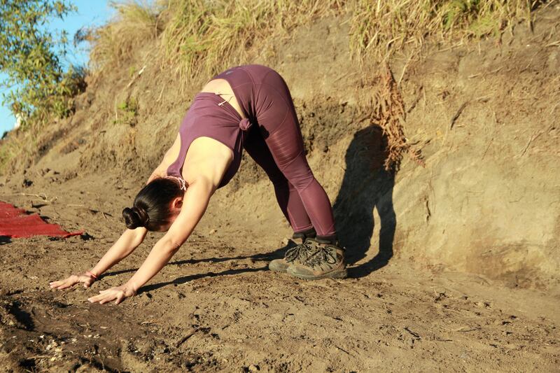 Downward-facing dog. This pose works on the hamstrings, calves, shoulders and spine, and gives an all-over stretch. Courtesy Nerry Toledo