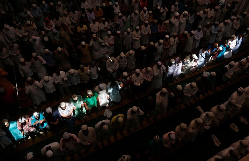 Indian Muslims offer prayers on the first Friday of the holy Islamic month of Ramadan at a mosque in Prayagraj, India. Muslims throughout the world are marking the month of Ramadan, the holiest month on the Islamic calendar during which devotees fast from dawn till dusk. AP Photo