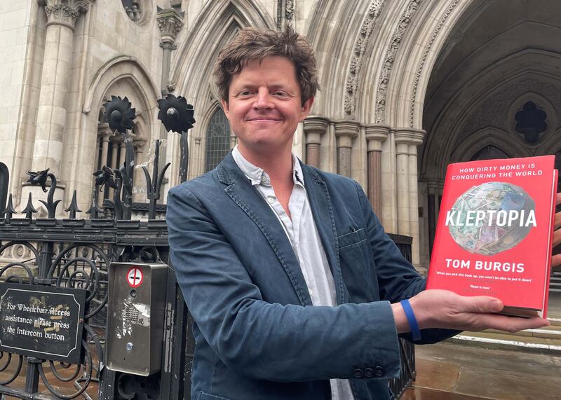 Tom Burgis outside the Royal Courts of Justice in London on March 2 after a High Court judge dismissed a libel claim by a Kazakh mining giant over his book, 'Kleptopia: How Dirty Money is Conquering the World'. PA