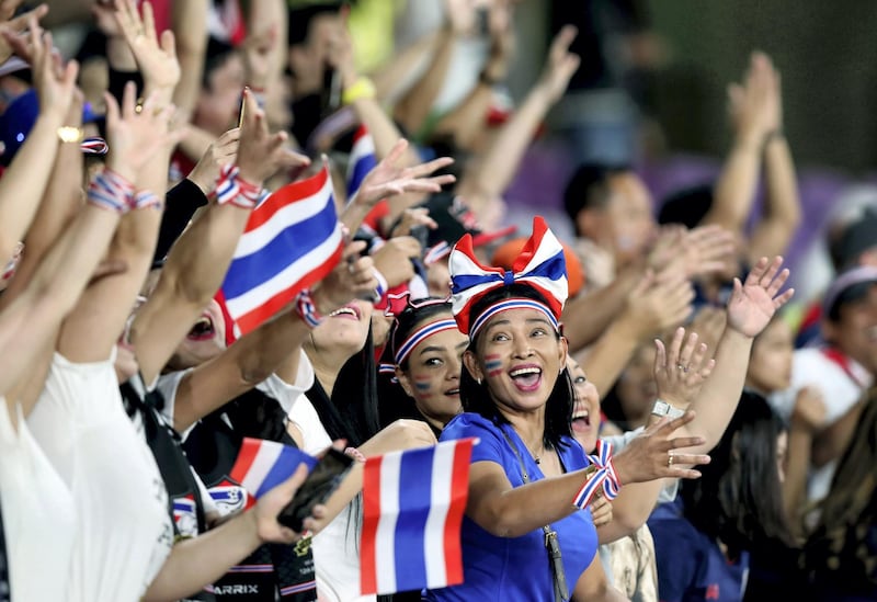 Al Ain, United Arab Emirates - January 14, 2019: Thailand fans before the game between UAE and Thailand in the Asian Cup 2019. Monday, January 14th, 2019 at Hazza Bin Zayed Stadium, Al Ain. Chris Whiteoak/The National