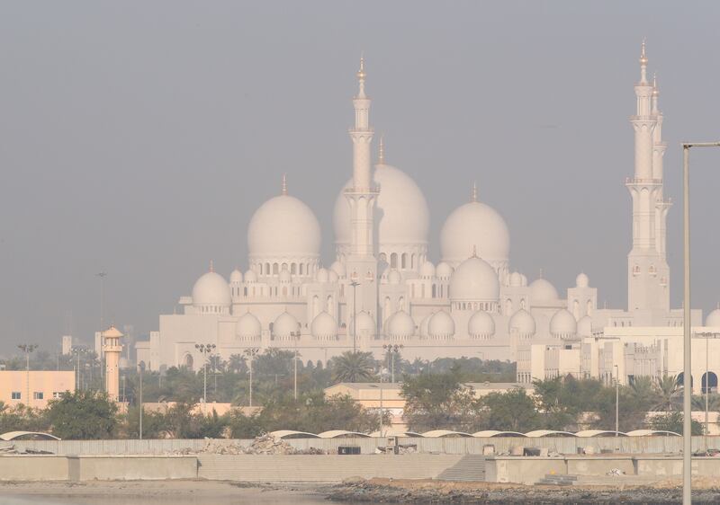 Sheikh Zayed Grand Mosque blanketed by fog. All photos Victor Besa / The National