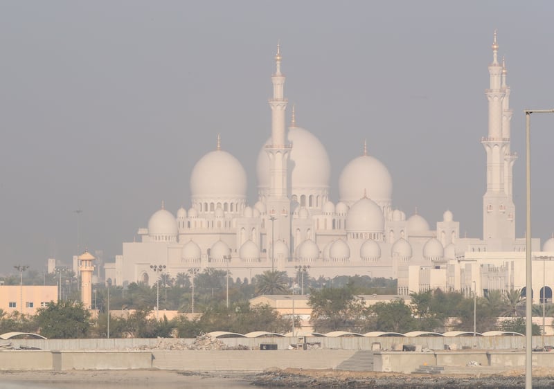 Morning fog blankets Sheikh Zayed Grand Mosque in Abu Dhabi. Victor Besa / The National