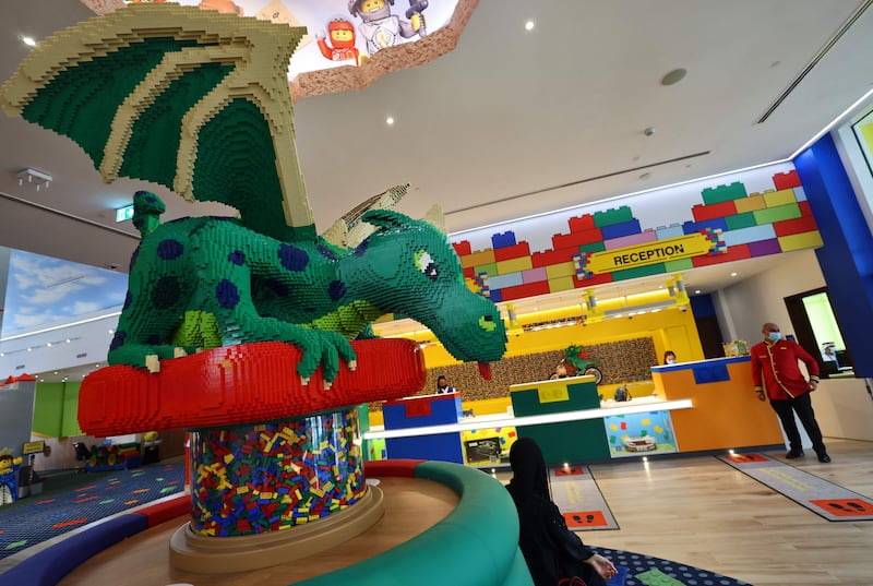 A giant Lego dragon guards the entrance to the hotel. AFP