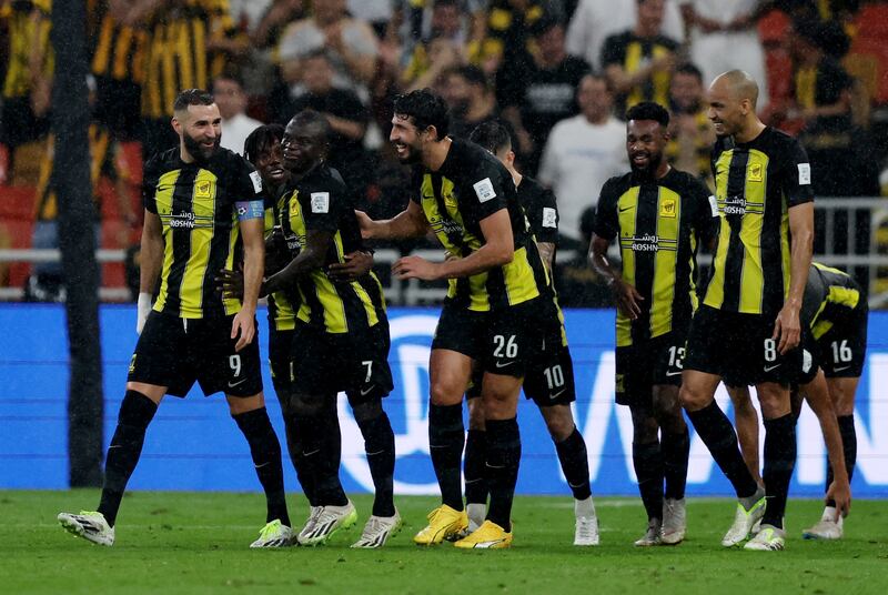 Al Ittihad's N'Golo Kante celebrates with teammates after scoring their second goal. Reuters