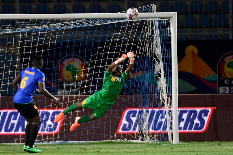 Tanzania goalkeeper Aishi Manula punches the ball away. AFP
