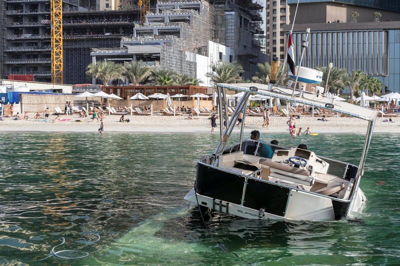 DUBAI, UNITED ARAB EMIRATES.  08 JANUARY 2019. A sunken yacht being salvaged by it���s owner Mohamed Irfan and some volunteer divers off the beach on JBR. (Photo: Antonie Robertson/The National) Journalist: None. Section: National.