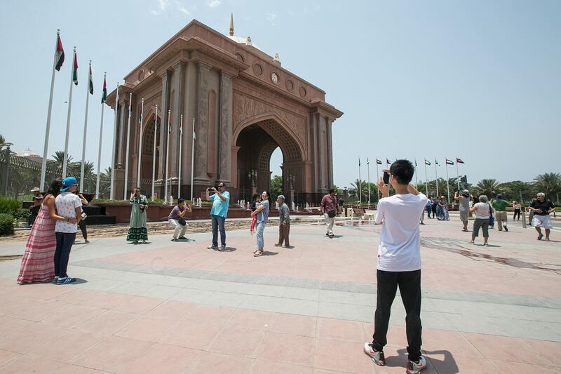 Abu Dhabi, United Arab Emirates. July 23, 2016///

Tourists take photos in front of Emirates Palace. Standalone. Abu Dhabi, United Arab Emirates. Mona Al Marzooqi/ The National 

ID: 35983
Section: National 
 *** Local Caption ***  160723-MM-Standalone-001.JPG