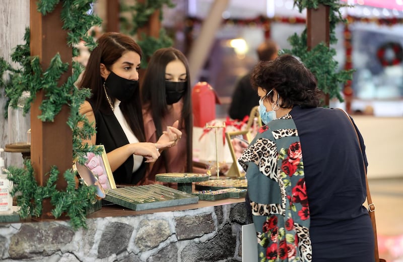 DUBAI , UNITED ARAB EMIRATES , November 26 – Visitors at the Winter Wonderland Festive Market at Mall of the Emirates in Dubai. ( Pawan Singh / The National ) For News/Online/Standalone/Instagram/Big Picture