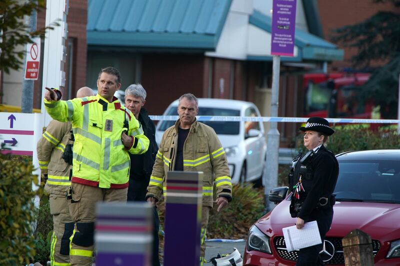 Emergency services officers outside the hospital.  Peter Byrne / PA