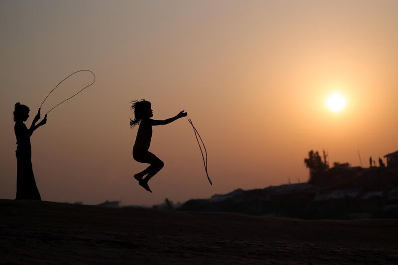 Rohingya refugee children play with skipping ropes at Balukhali camp in Cox’s Bazar, Bangladesh. Reuters