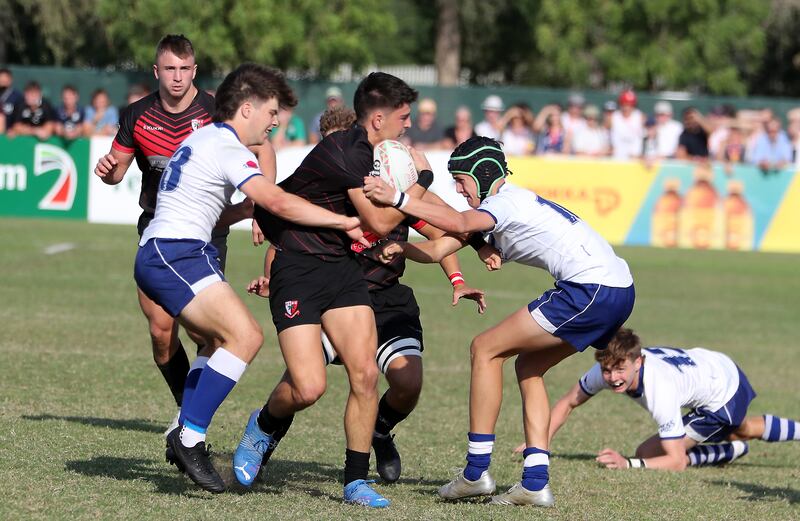 Players in action during the Gulf Under 19 boys cup semi-final 2 match between Dubai English Speaking College (black) vs Jumeirah English Speaking School.