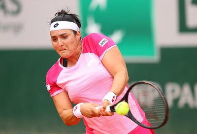 PARIS, FRANCE - OCTOBER 03: Ons Jabeur of Tunisia plays a backhand during her Women's Singles third round match against Aryna Sabalenka of Belarus on day seven of the 2020 French Open at Roland Garros on October 03, 2020 in Paris, France. (Photo by Julian Finney/Getty Images)