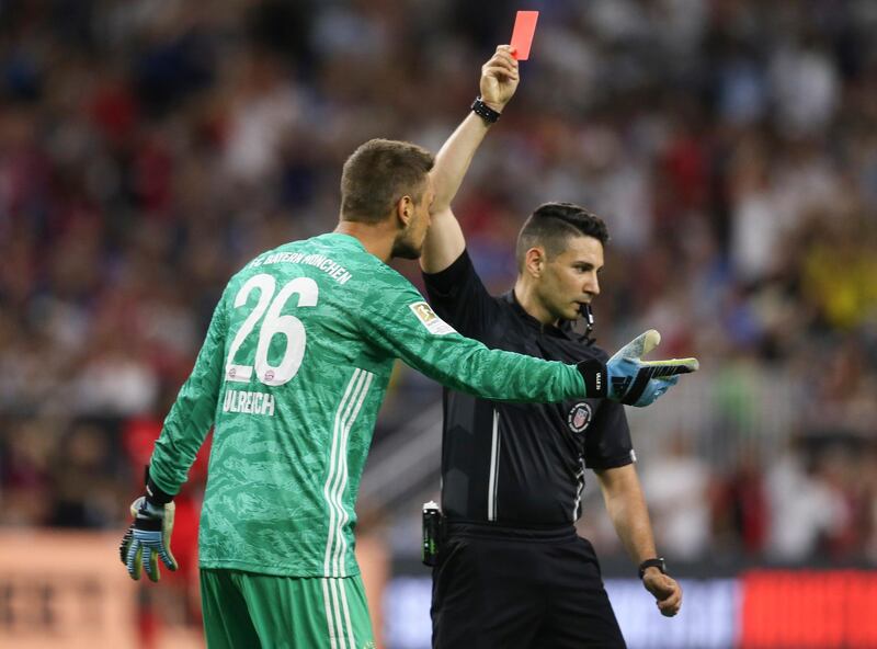 Bayern goalkeeper Sven Ulreich protests his red card. Reuters