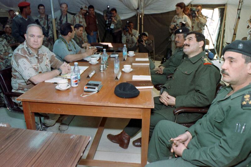 - FILE PHOTO 3MAR91 - File photo of Allied Forces Commander U.S. General Norman Schwarzkopf (L) meeting with Iraqi Lt-General Khalid Sultan Ahmed (2nd R) and other unidentified Iraqi commanders in Safwan occupied Iraq March 3, 1991. The meeting was to set conditions for cease fire and surrender ending the Gulf War. Iraq will mark on January 17 the 10th anniversay of the Gulf War that ended a seven month occupation of Kuwait.