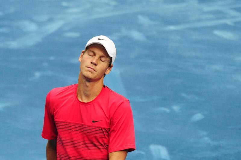 Czech Tomas Berdych reacts during the final tennis match of the Madrid Masters against Swiss Roger Federer  on May 13, 2012 at the Magic Box (Caja Magica) sports complex in Madrid.  Federer won 3-6, 7-5, 7-5.  AFP PHOTO / JAVIER SORIANO (Photo by JAVIER SORIANO / AFP)
