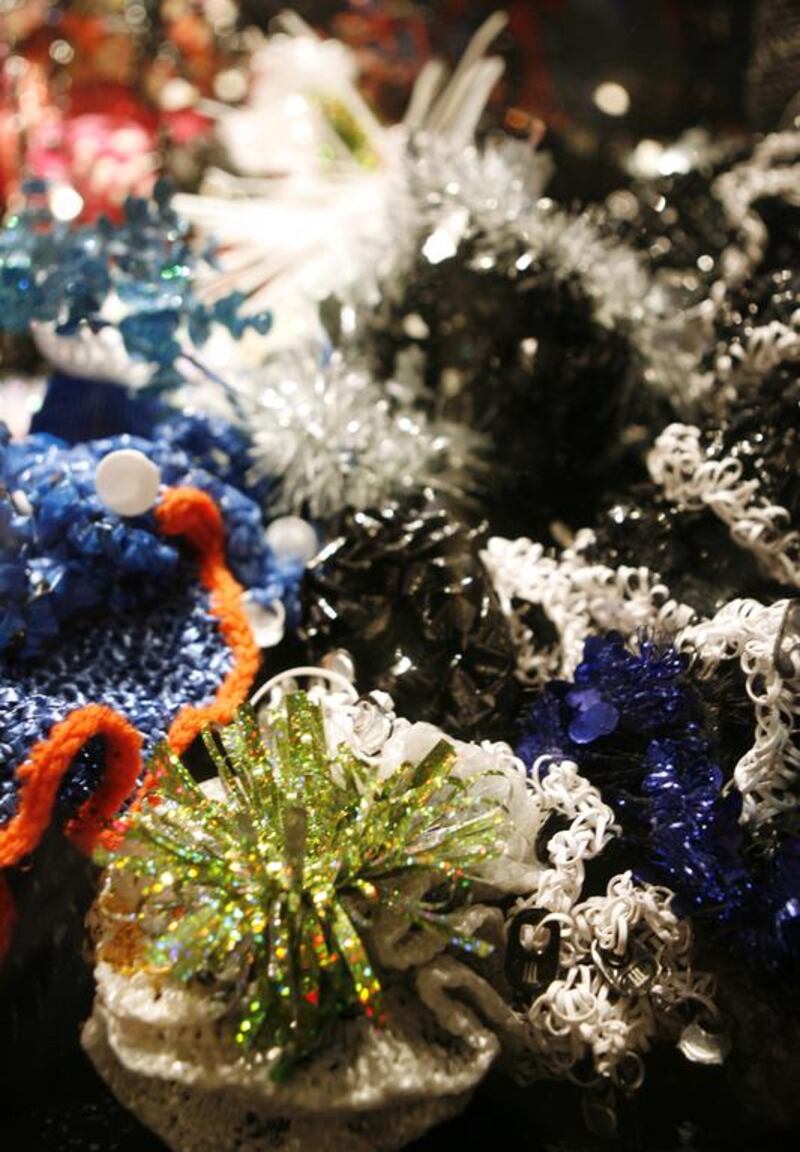 Part of the Wertheim's Hyperbolic Crochet Coral Reef on display at the Smithsonian's Museum of Natural History in Washington DC. The crocheted artworks are made of recycled materials and fabrics to represent endangered and polluted reefs. Kimihiro Hoshino / AFP