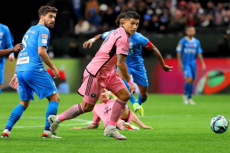 Inter Miami's Uruguayan forward Luis Suarez runs with the ball. AFP