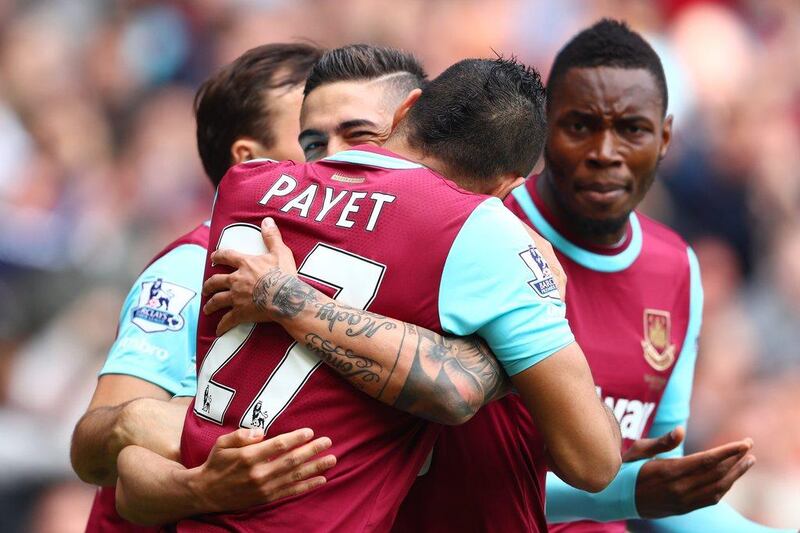 Manuel Lanzini of West Ham United celebrates a goal with Dimitri Payet in the team's Premier League match against Crystal Palace last weekend. Clive Rose / Getty Images / April 2, 2016