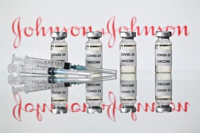 (FILES) A file photo taken on November 17, 2020 shows vials with Covid-19 Vaccine stickers attached and syringes with the logo of US pharmaceutical company Johnson & Johnson. The Johnson & Johnson vaccine is highly effective against severe Covid-19, including against the South African and Brazil variants, new documents released by the US Food and Drug Administration showed on February 24, 2021. In large clinical trials, the vaccine efficacy against severe disease was 85.9 percent in the United States, 81.7 percent in South Africa, and 87.6 percent in Brazil.
 / AFP / JUSTIN TALLIS
