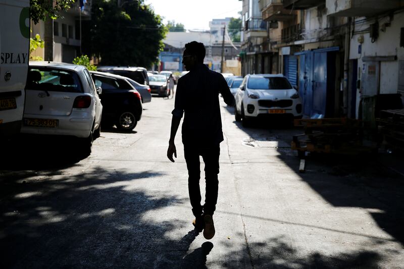 Teklit Michael, 29, an asylum seeker from Eritrea, walks home in Tel Aviv, Israel in June 2017. Photo: Reuters