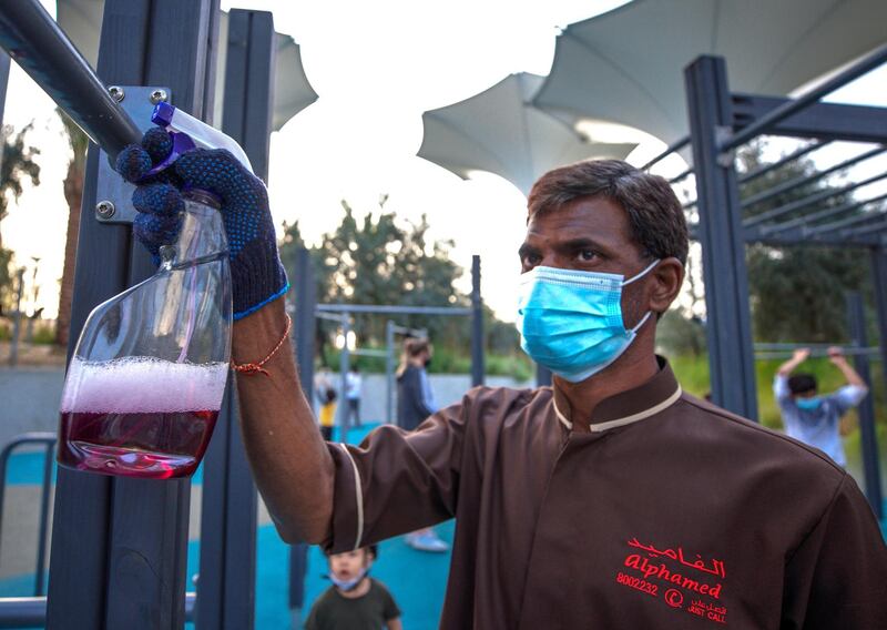 Abu Dhabi, United Arab Emirates, January 21, 2021.  Cleaners are always present around Al Fay Park on Reem Island.
Victor Besa/The National 
Section:  LF
Reporter: Panna Munyal