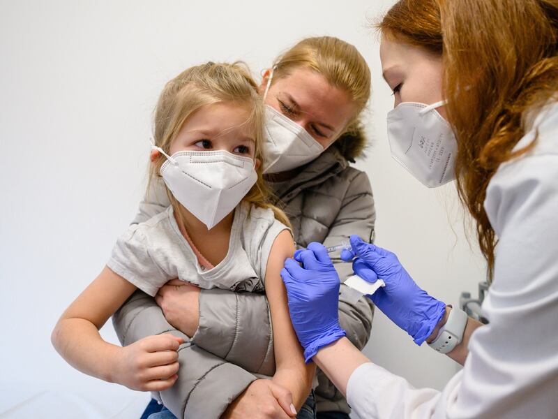A young girl receives a dose of the Pfizer-BioNTech vaccine developed for children between 5 and 11 years of age, at the Fejer County Szent Gyorgy Teaching Hospital in Szekesfehervar, Hungary. EPA