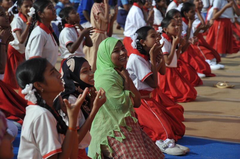 Indian school students take part in a yoga camp in Hyderabad.  Noah Seelam / AFP Photo
