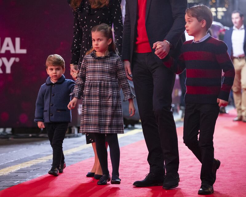 Prince William and his wife Kate with their three children at a special pantomime performance at London's Palladium Theatre to thank key workers and their families for their efforts throughout the pandemic. PA