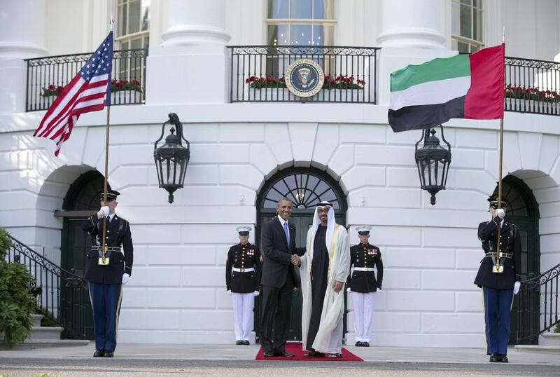 President Barack Obama, left, shakes hands with Sheikh Mohamed bin Zayed Al Nahyan, Crown Prince of Abu Dhabi, Deputy Supreme Commander of the UAE Armed Forces and Chairman of the Executive Council of the Emirate of Abu Dhabi, as he arrives at the South Lawn of the White House in Washington. Carolyn Kaster / AP Photo