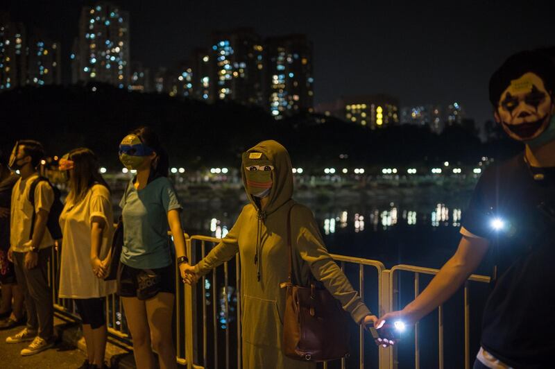 Protesters wear a mask during a protest on October 18, 2019 in Hong Kong, China. Getty Images