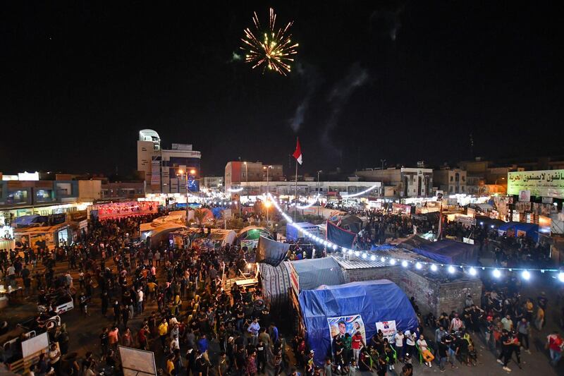 Iraqi protesters start an indefinite sit-in at al-Haboubi Square in the southern city of Nasiriyah in Dhi Qar province during the first anniversary of a mass anti-government movement. AFP