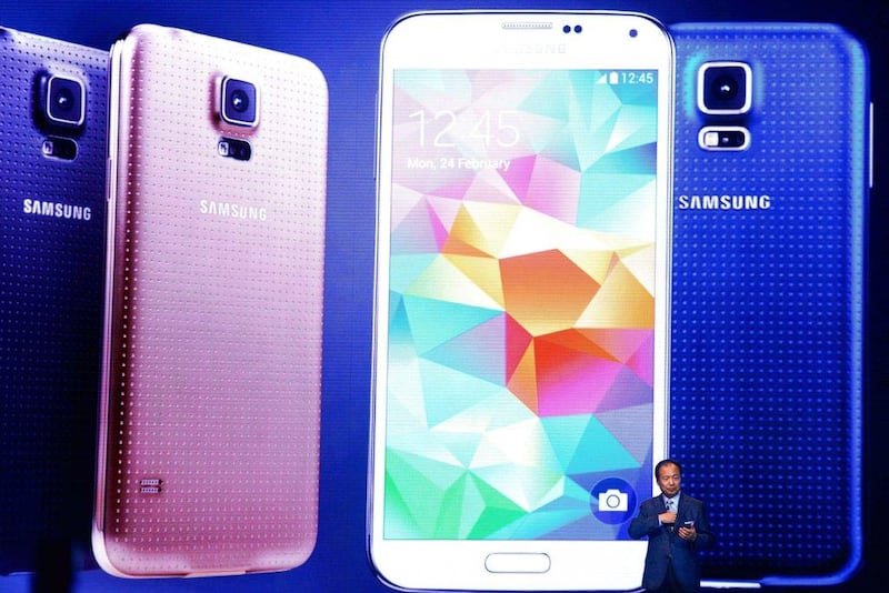 Chief executive and president of Samsung JK Shin presents the new Samsung Galaxy S5 during the first day of the Mobile World Congress 2014 in Barcelona. David Ramos / Getty Images

