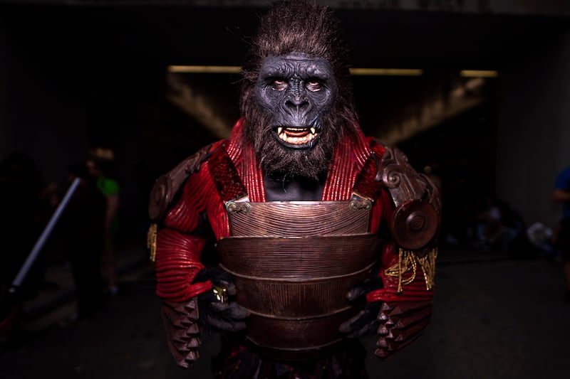 An attendee dressed as a character from 'Planet of the Apes' at New York Comic Con. Charles Sykes / Invision / AP