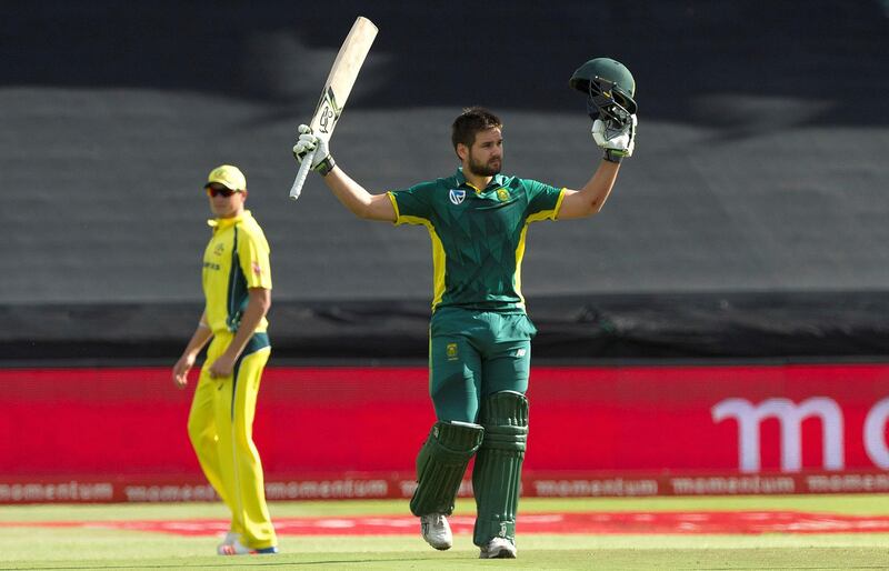 South Africa's Rilee Rossouw (R) acknowledges the crowd after scoring his century in the one Day International cricket match against Australia, on October 12, 2016, at Newlands Stadium, in Cape Town. 
South Africa won the toss and decided to bat in the fifth and final one-day international against Australia.  / AFP PHOTO / RODGER BOSCH