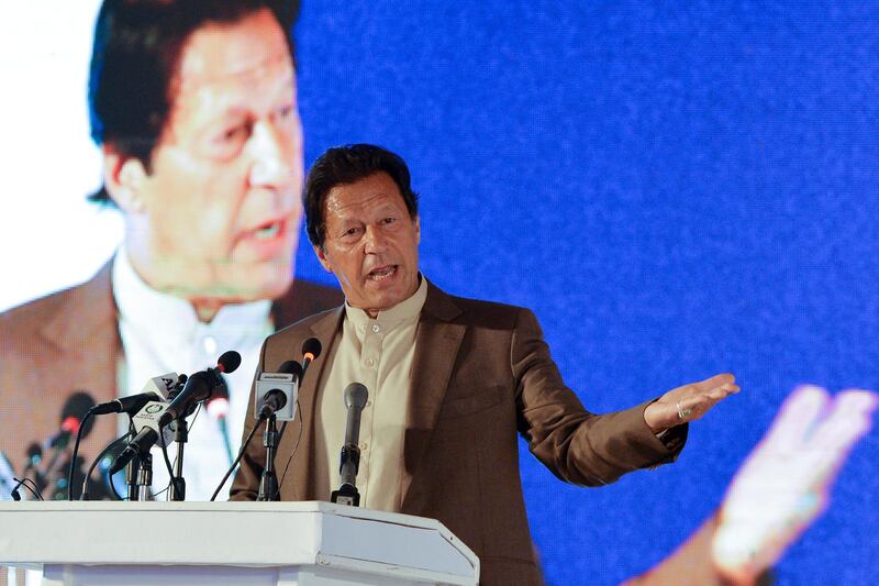 Pakistan's Prime Minister Imran Khan delivers a speech during the Refugee Summit Islamabad to mark 40 years of hosting Afghan refugees, in Islamabad on February 17, 2020. - Pakistani Prime Minister Imran Khan insisted on February 17 that his country is no longer a militant safe haven, and said his administration fully supports the Afghan peace process. (Photo by Aamir QURESHI / AFP)