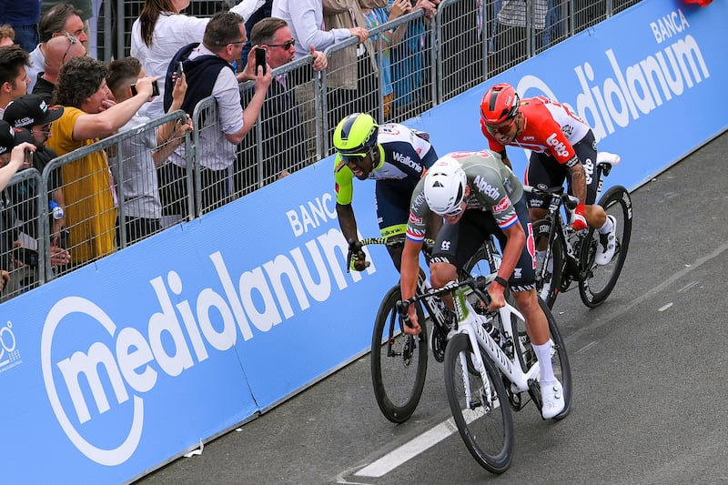 Mathieu van der Poel outsprints Biniam Girmay and Caleb Ewan to win the opening stage of the Giro d'Italia. AP