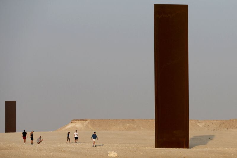 Two of the four steel slabs of US artist Richard Serra, part of the 'East-West/West-East' installation in the Qatari desert.  AFP