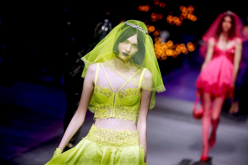 Lime green makes an appearance on the runway. EPA