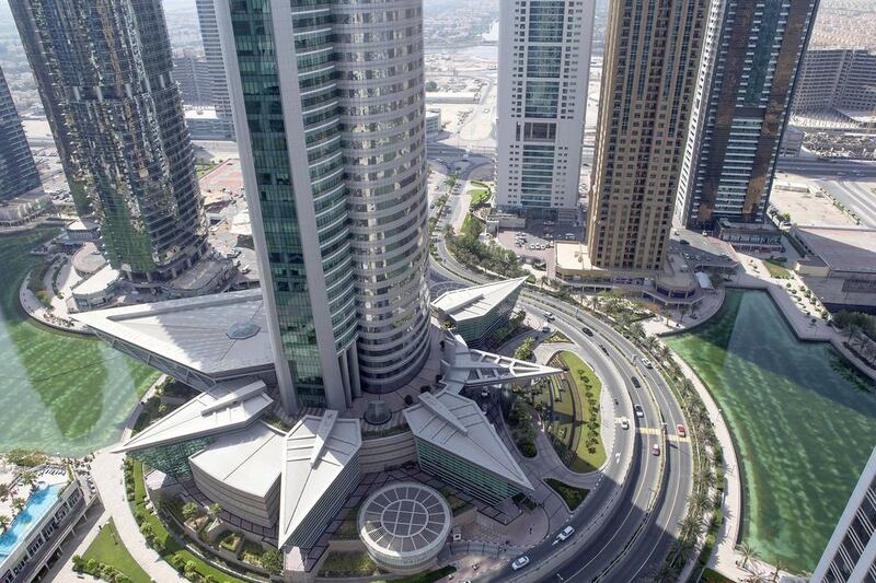 Jumeirah Lakes Towers apartments: Q1-Q2 2015 down 3%. Q2 2014-Q2 2015 down 4%. Studio - Dh60,000 to Dh70,000. 1BR - Dh75,000 to Dh95,000. 2BR - Dh110,000 to Dh150,000. 3BR - Dh150,000 to Dh180,000. Antonie Robertson / The National