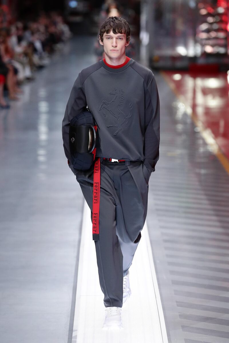 A model walks the runway at the fashion debut of the first co-ed Ferrari collection at Ferrari Factory on June 13, 2021 in Maranello, Italy. Getty Images