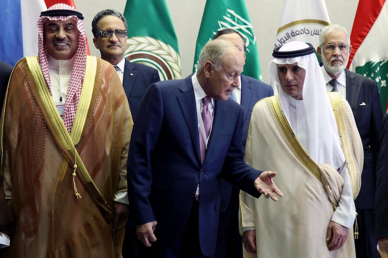 Arab League Secretary-General Ahmed Aboul Gheit speaks with Saudi Arabia's Foreign Minister Adel al-Jubeir as Kuwaiti Foreign Minister Sheikh Sabah Khaled al-Sabah looks on during a group photo on the sideline of a preparatory meeting of Arab Foreign Ministers in Riyadh.  Ahmed Yosri / EPA
