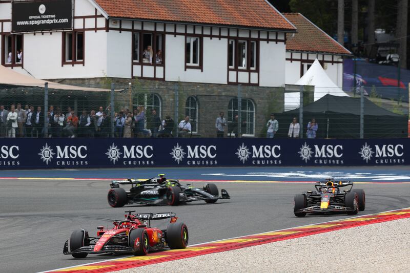 Charles Leclerc of Ferrari leads Max Verstappen and Lewis Hamilton. Getty