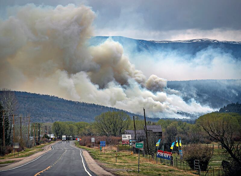 A flare up near Cleveland, New Mexico, darkens the sky. Santa Fe New Mexican / AP