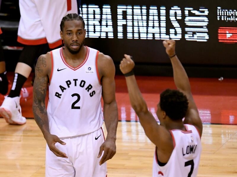 Toronto Raptors' Kawhi Leonard and Kyle Lowry celebrate. AP Photo